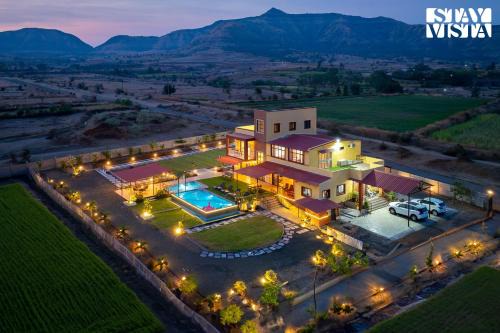 Bajarwadi Villa | StayVista at Mangifera Agro Estate with Pool, Wi-Fi
