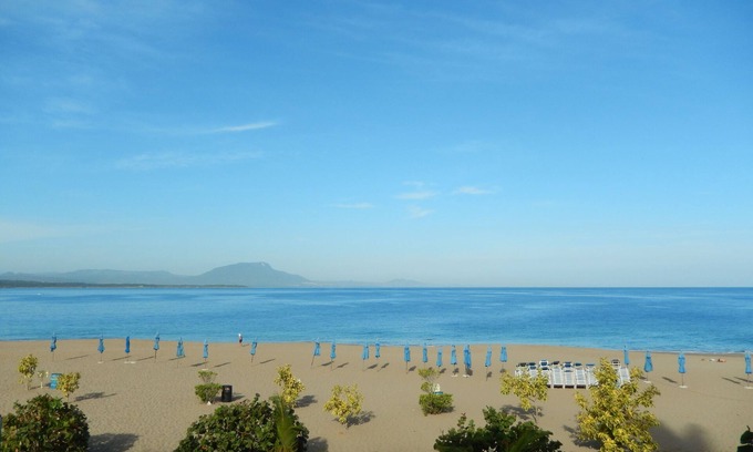 El Batey Apartment | Steps from Sandy Beach, Central 2BD Condo, Pool, Internet/Cable TV, AC, Balcony