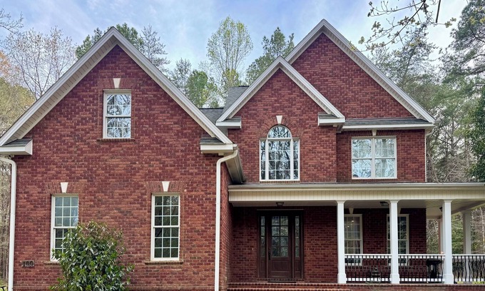 Chapel Hill House | Stunning Custom 4-bedroom with creek, trails, & privacy in Chapel Hill