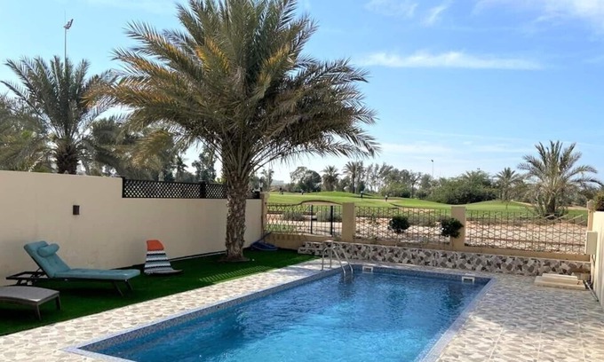 Al Hamra Village Apartment | Stunning Pool villa with Garden RAK