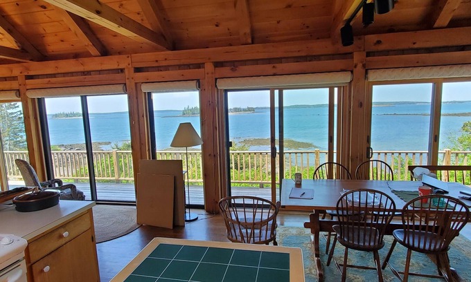 South Addison Cottage | Stunning sunset views from this adorable oceanfront cottage