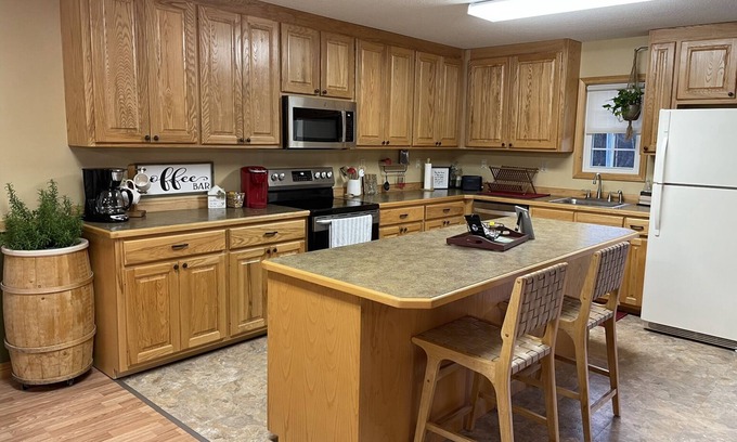 Marion Apartment | Suite Bee Studio Apartment; North Main Street with Creekside Deck