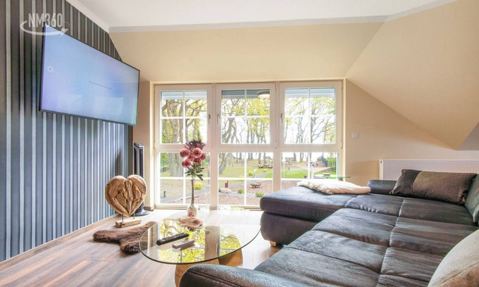 Monchgut-Granitz Apartment | Suite MAGNI WE 23 ODINS View with view to the private beach, sauna, quiet location