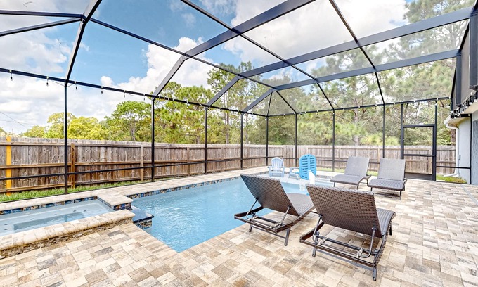 Summerfield House | Summerfield home with a fenced-in yard, pool, hot tub, & games