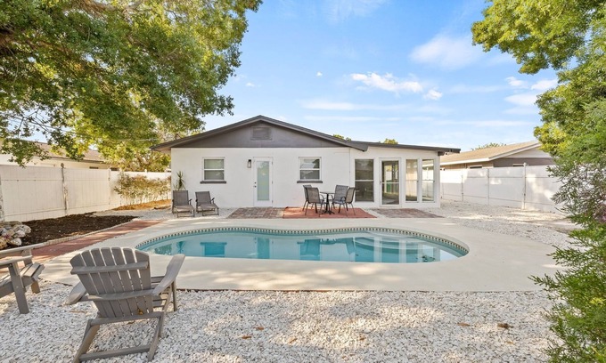 Palmetto House | Sunny Palmetto Oasis: 4BR Home with Private Pool by RedAwning