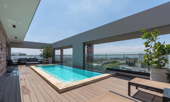 Santiago Province Condo | Super Modern Luxury Condo w/Rooftop Pool & Gym!