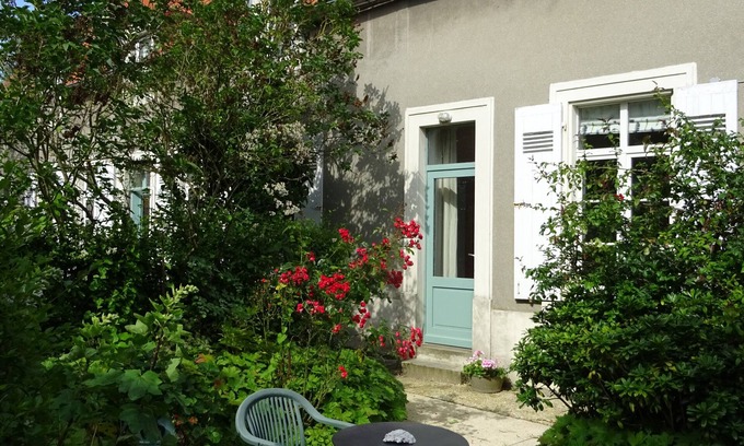 Wimille Apartment | The Artist's Den. Charming apartment nestled in lush greenery.