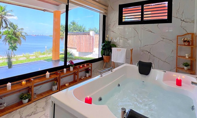 Yopougon Villa | The Bay Chalets: Villa 1 with Pool and Lagoon View.