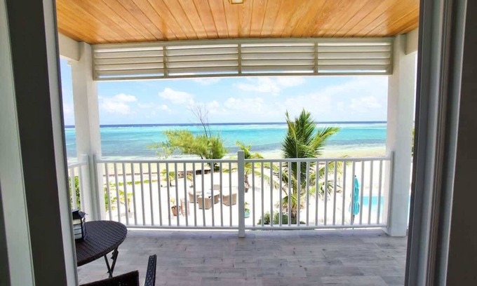 Colliers Bay Condo | The Blue Iguana Oceanfront Studio Cottage in East End