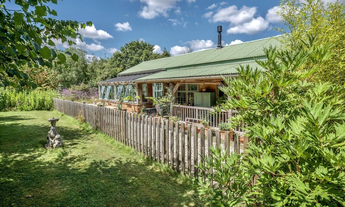 Somerton House | The Garden Room. Timber framed, light and airy accommodation with veranda.