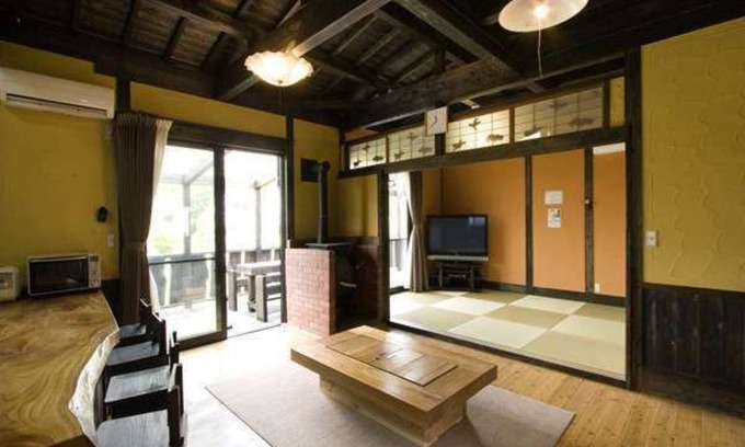 Kurokawa Onsen Cottage | The openair bath comes with a vat bath and an ind/Aso-gun Kumamoto