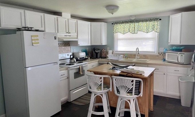 Hudson House | THE OTTER POD; a rare Canal Waterfront Gulf access Home,