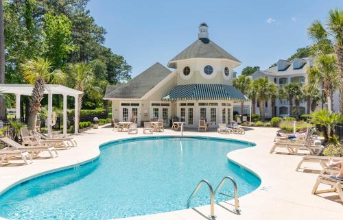 Carolina Forest Apartment | The Salty Fairway, Golf Course Condo with Resort Style Pool, 5 Miles from Beach, Fully updated