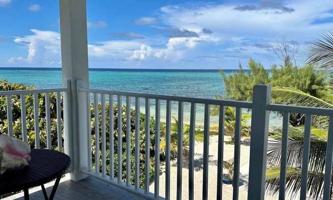Colliers Bay Condo | The Sunrise Oceanfront Studio Cottage in East End
