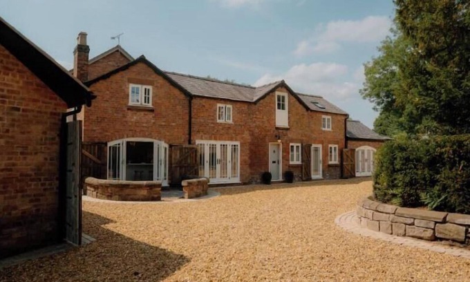 Bunbury House | This historic building offers an inviting retreat with its charming blend of comfort and elegance.