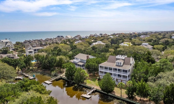 Debordieu Colony House | This vibrant family home features 8 bedrooms, and 8 bathrooms, ocean and creek views