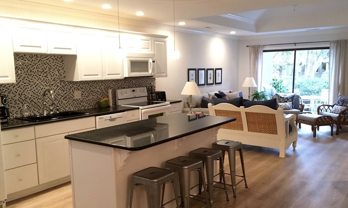 West Beach Cottage | Tranquil Escape, Beautiful Lagoon View & Community Pool!