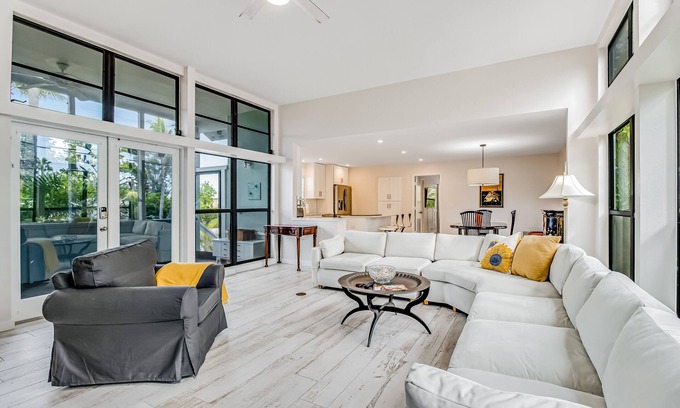 Longbeach Village House | Tree-lined home w/amazing decor & screened porch - near beach/dining