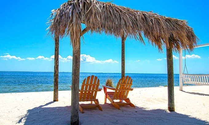 Rocky Point Condo | Tropical Serenity-Water View, Heated Pool Tiki Bar