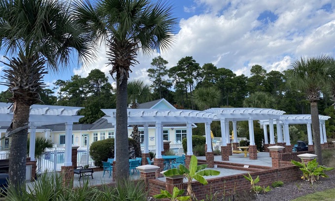 Garden City Villa | Tupelo Bay Luxury Condo 1 Mile From The Beach, minutes from the Airport.