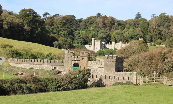 Caerhays Cottage | Turreted gatehouse to the historic Caerhays Castle located on the beach on the south Cornish Coast