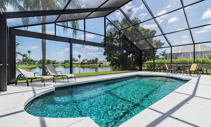 Sabal Harbour House | Turtle Lake - Inspiring Lake Views with Heated Pool