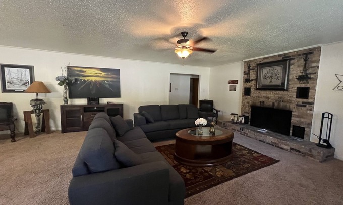 Mount Ida House | Two bedroom House with fenced in yard, covered patio area, located at the Joplin Inn at the entrance to Mountain Harbor, just 1 1/2 miles from Lake Ouachita. by RedAwning