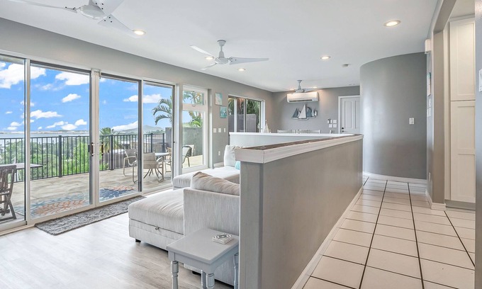 Kaneohe House | Two-story ocean view home with a furnished patio & deck, washer/dryer, & AC