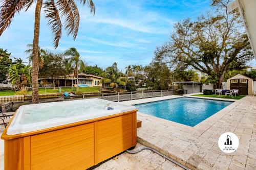 Ojus House | Uhost AI - Luxurious 5B Home w Pool & Lounge