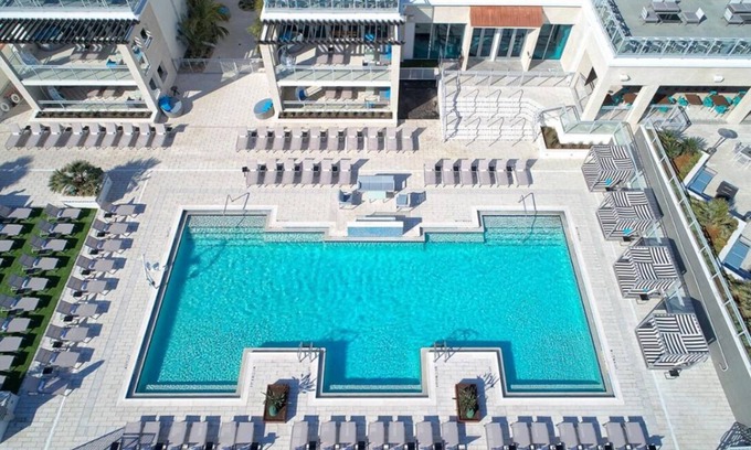 East Daytona Hotel | Unwind and Indulge In Our Oasis! 4 Relaxing Units w/City View, Outdoor Pool