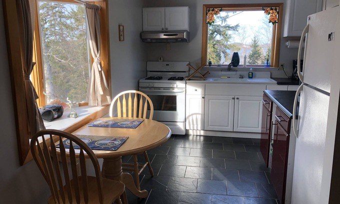 Eastport Apartment | Updated, Quiet Location, deck, trees, one bedroom plus futon, Walk To Downtown.