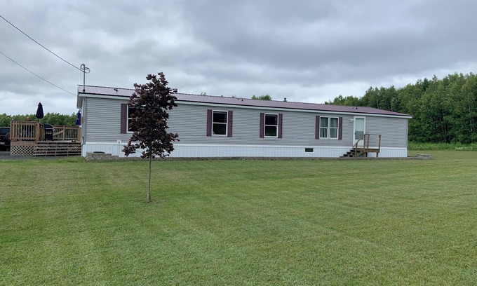 Patten House | UPNORTH GETAWAY. Spacious 4 bedroom, 3 bathroom. On the ATV/Snowmobile Trails