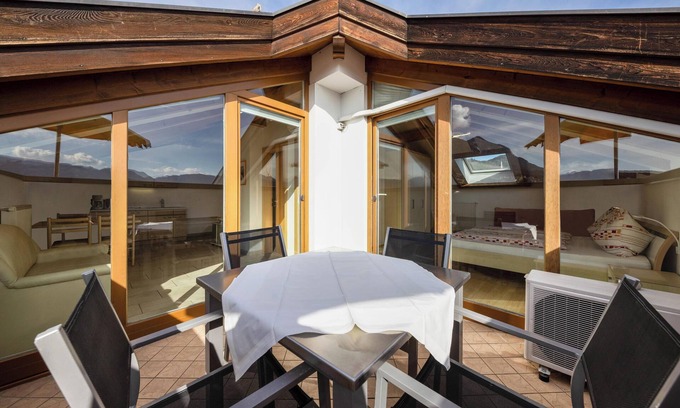 Caldaro Sulla Strada del Vino Apartment | Vacation Apartment "Stompferhof Mansarde" in Caldaro with Shared Pool & Garden