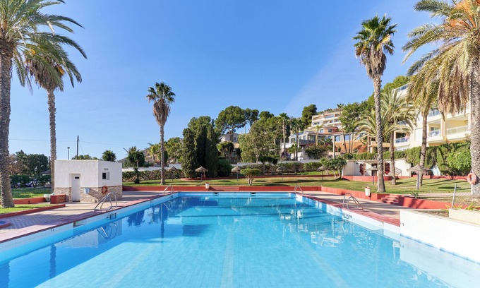 Almunecar House | Vacation Home "Ático Capela Vistas Al Mar" with Sea View, Shared Pool & Wi-Fi