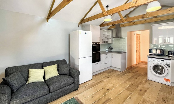 New Romney Cottage | Very spacious property across the road from a lovely golden sanded beach.
