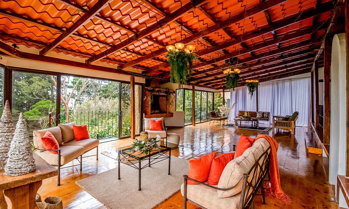 Roble House | View paradise with an expansive yard, wood-burning fireplace, and W/D