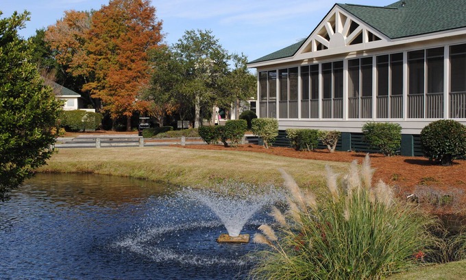 North Litchfield Beach Condo | Villa with community pool access located within gated Litchfield By the Sea community