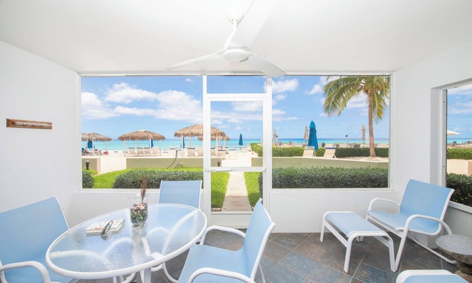 Seven Mile Beach Condo | Walk out the door onto 7-Mile Beach! Discovery Point Club #28