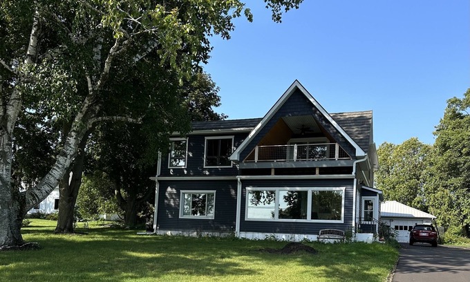 Sturgeon Bay Apartment | Water views from every window, covered porch & private deck, 7 min walk to beach