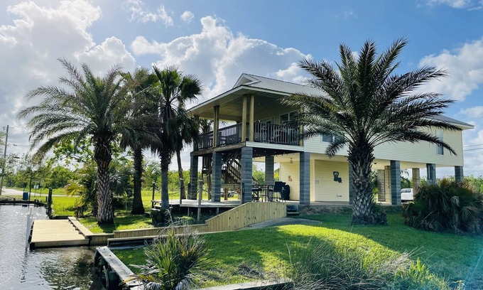 Shoreline Park House | Waterfront Camp in Jourdan River Estates