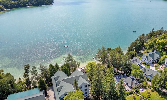 Elkhart Lake Condo | Waterfront Condo, Private Beach, Outdoor/Indoor Pools, & Walkable to Downtown