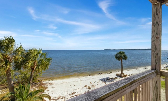 Cedar Key Condo | Waterfront condo with king bed and large sunrise deck