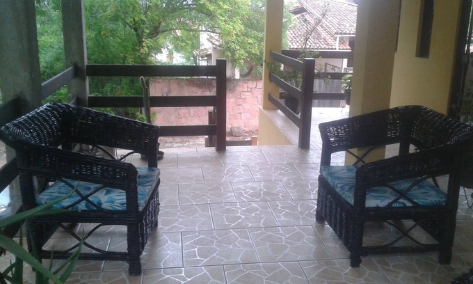 Lencois House | Yellow house. Cozy in the middle of the trees