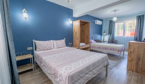 Standard Triple Room, Balcony, Garden View