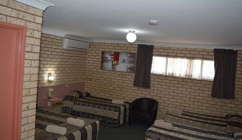 Deluxe Quadruple Room (1 queen and 3 single beds)