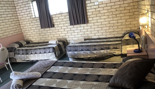 Deluxe Triple Room (1 queen and 2 single beds)