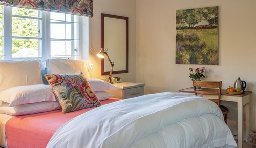 Upstairs room with covered verandah