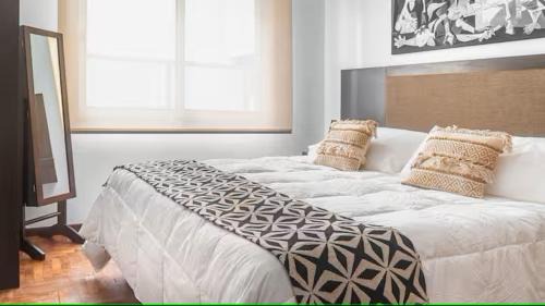 One-Bedroom Apartment with Balcony and City View