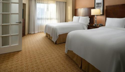 One-Bedroom Suite with Two Double Beds and Sofa Bed with Balcony