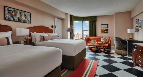 Graduate Room with Two Queen Beds and Skyline View